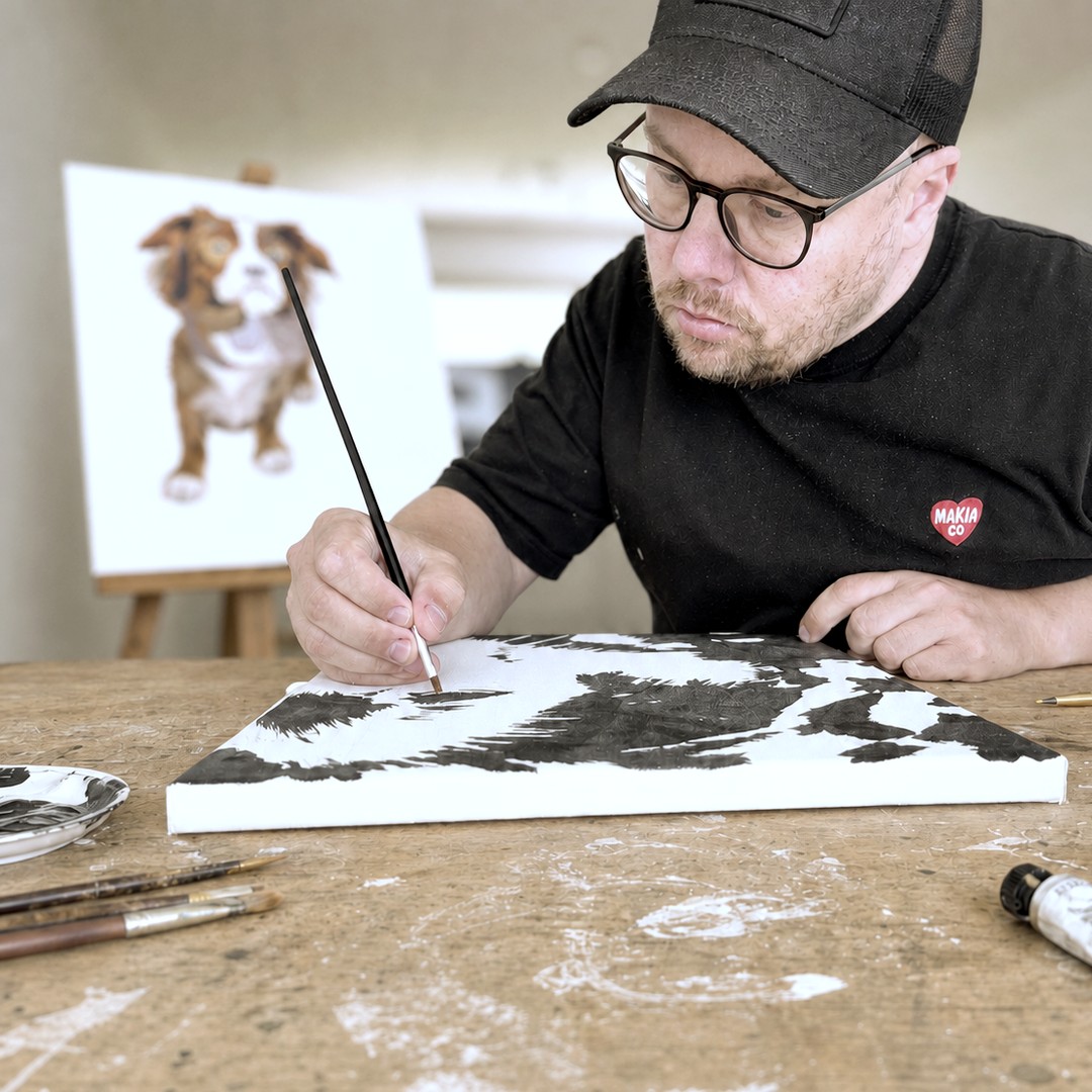 Mikko Ohtonen painting a piece in his studio