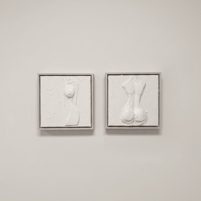 Duo, hand-sculpted relief